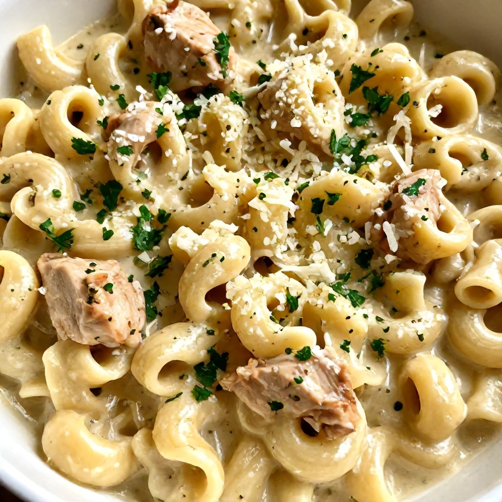 Plated serving of creamy Crockpot Chicken Tortellini