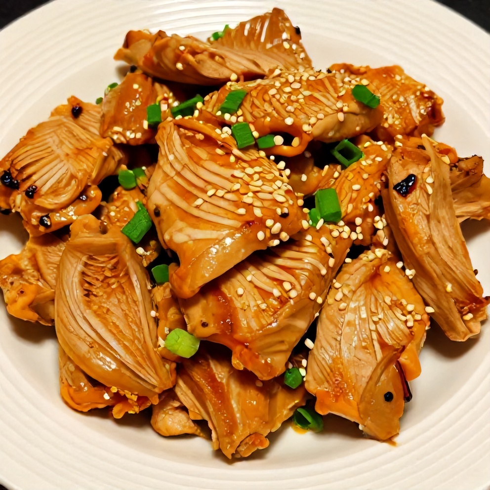 Plated orange teriyaki turkey medallions